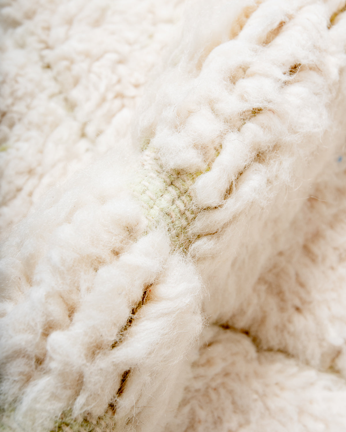 Modern, designer, handcrafted Berber rug from Morocco. Beniourain carpet with beautiful colours and patterns and fluffy wool texture.